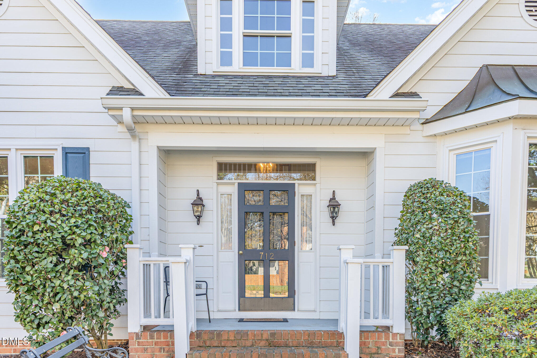 712 Hardimont Road Raleigh, NC 27609 - Photo 3 of 40 front view of a house with a potted plant