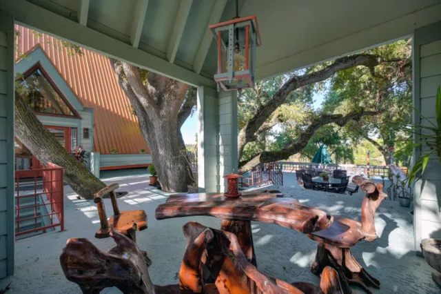 a kitchen with stainless steel appliances granite countertop a stove and a refrigerator