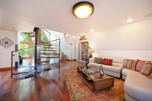 a backyard of a house with a yard and lake view