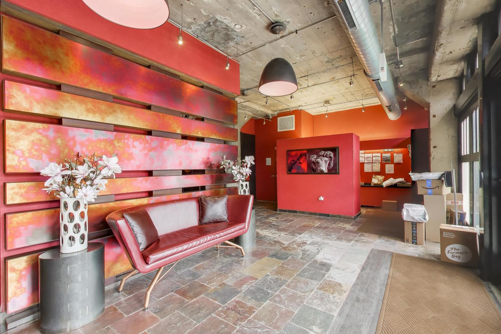 1069 West 14th Place, Unit 228 Chicago, IL 60608 - Photo 18 of 20 a view of a chairs with wooden floor