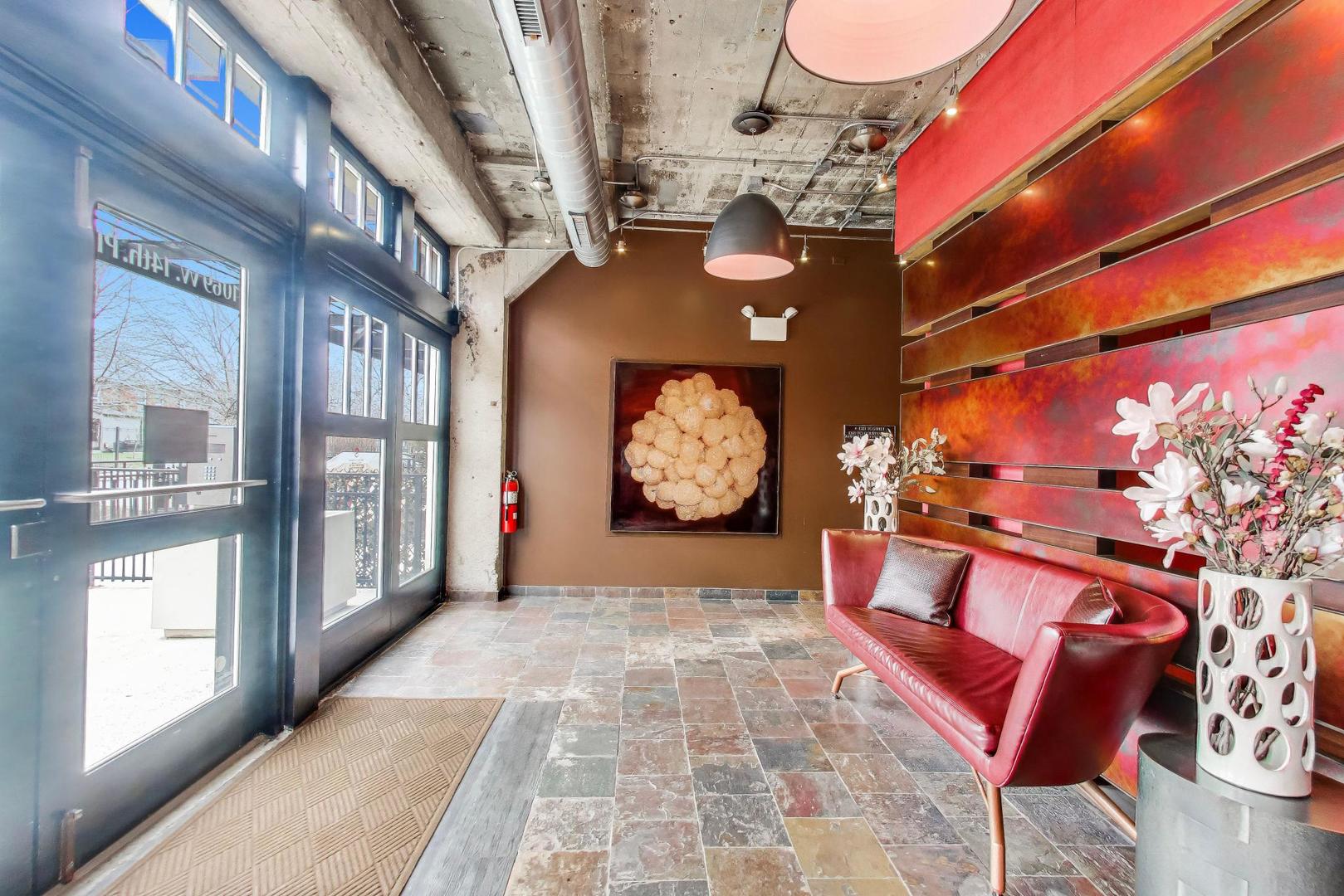 1069 West 14th Place, Unit 228 Chicago, IL 60608 - Photo 19 of 20 a view of an entryway with a room