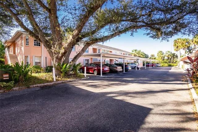 a view of lake with green space