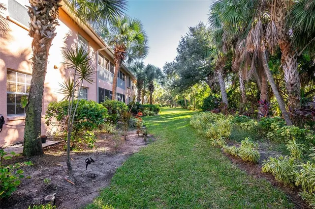 a view of a couches under an umbrella