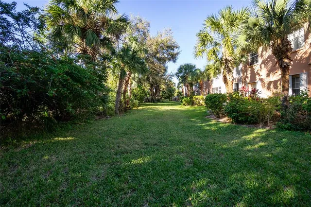 a living room with lots of furniture and a flat screen tv