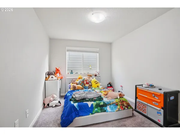 a bed room with a bed and a couch