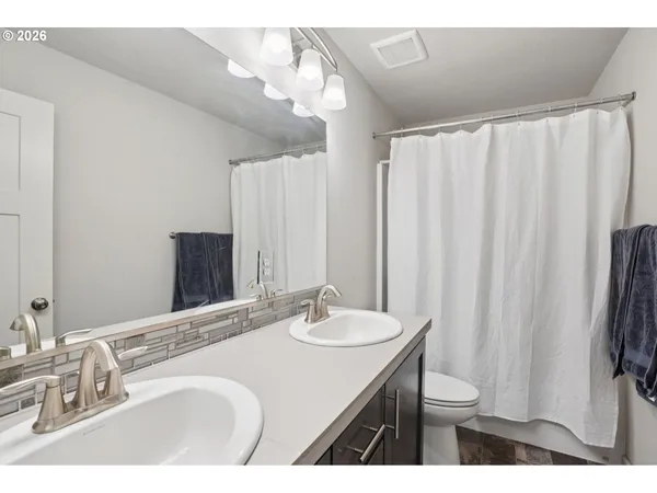 a bed room with a bed and a couch