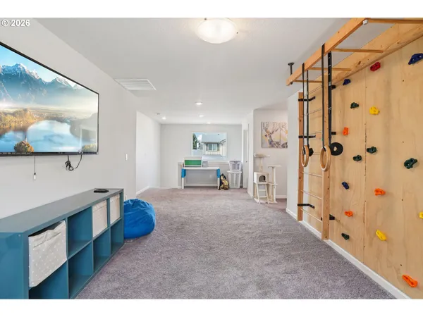 a view of a backyard with sitting area