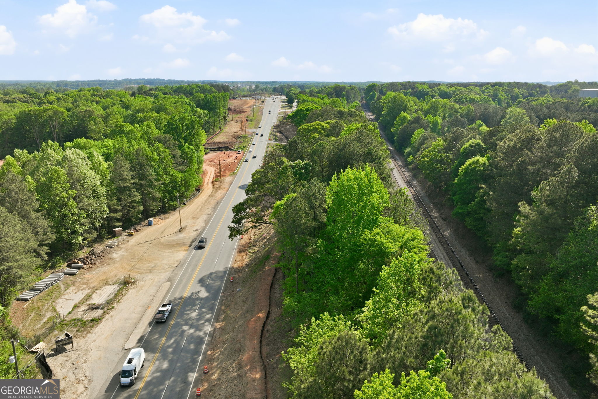 0 Highway 29 Dacula, GA 30019 - Photo 5 of 6 a view of a lake with a city