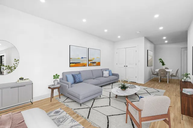 a living room with furniture and a table