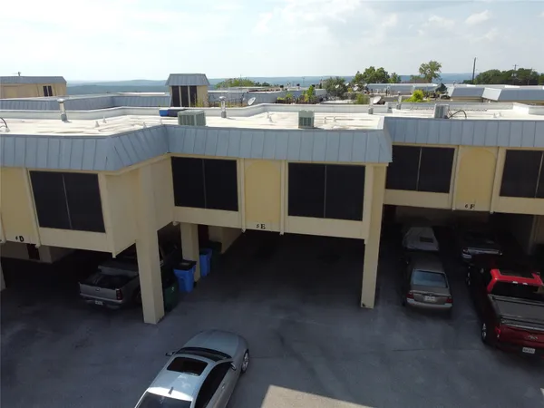 a terrace of a house with outdoor seating