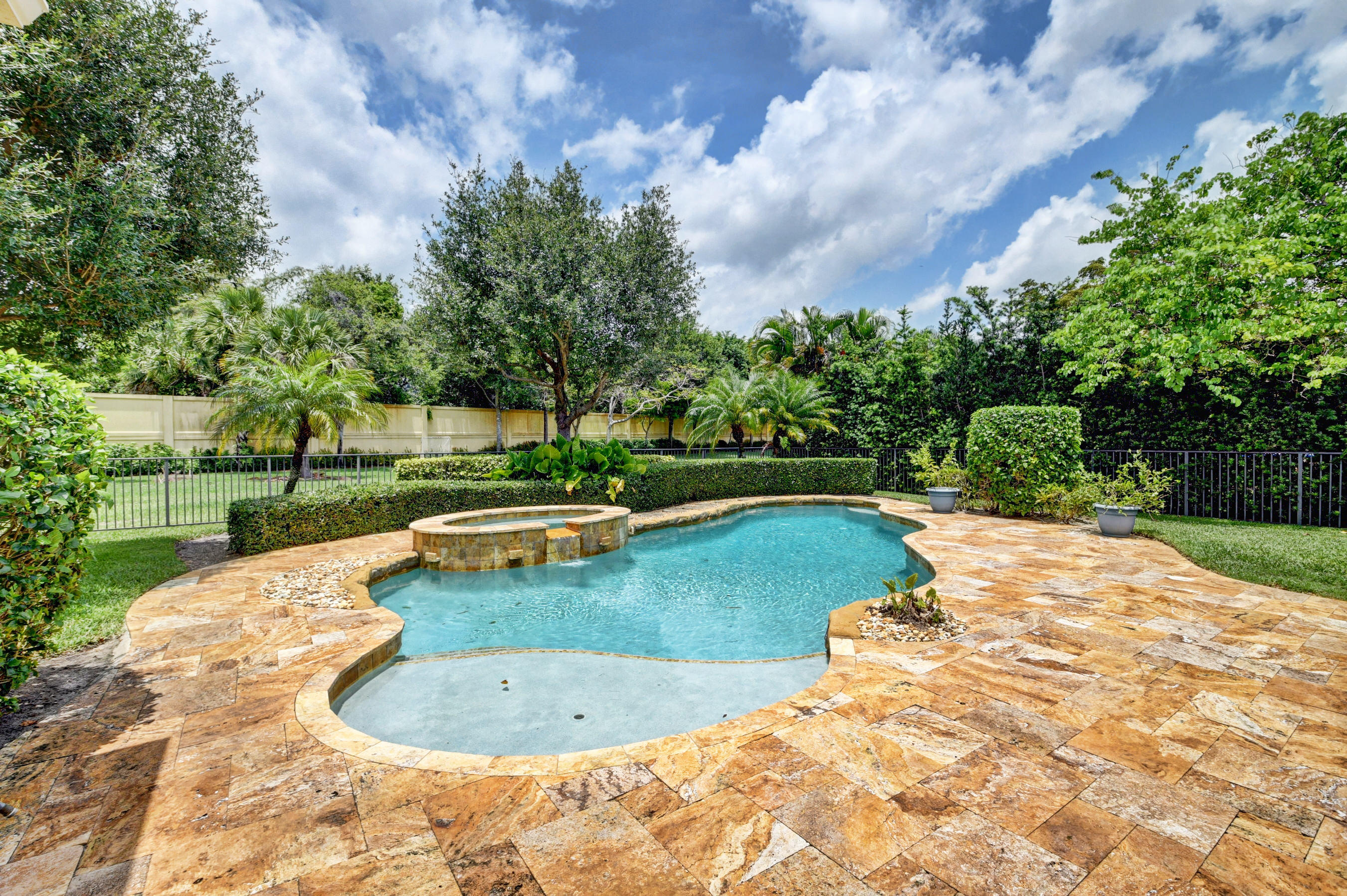16155 Rosecroft Terrace Delray Beach, FL 33446 - Photo 26 of 40 a view of a swimming pool with a yard