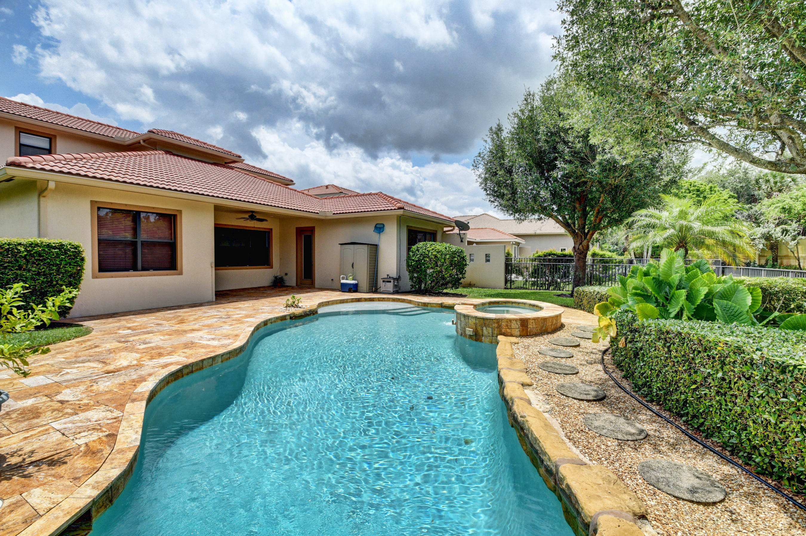 16155 Rosecroft Terrace Delray Beach, FL 33446 - Photo 29 of 40 a view of house with swimming pool and yard