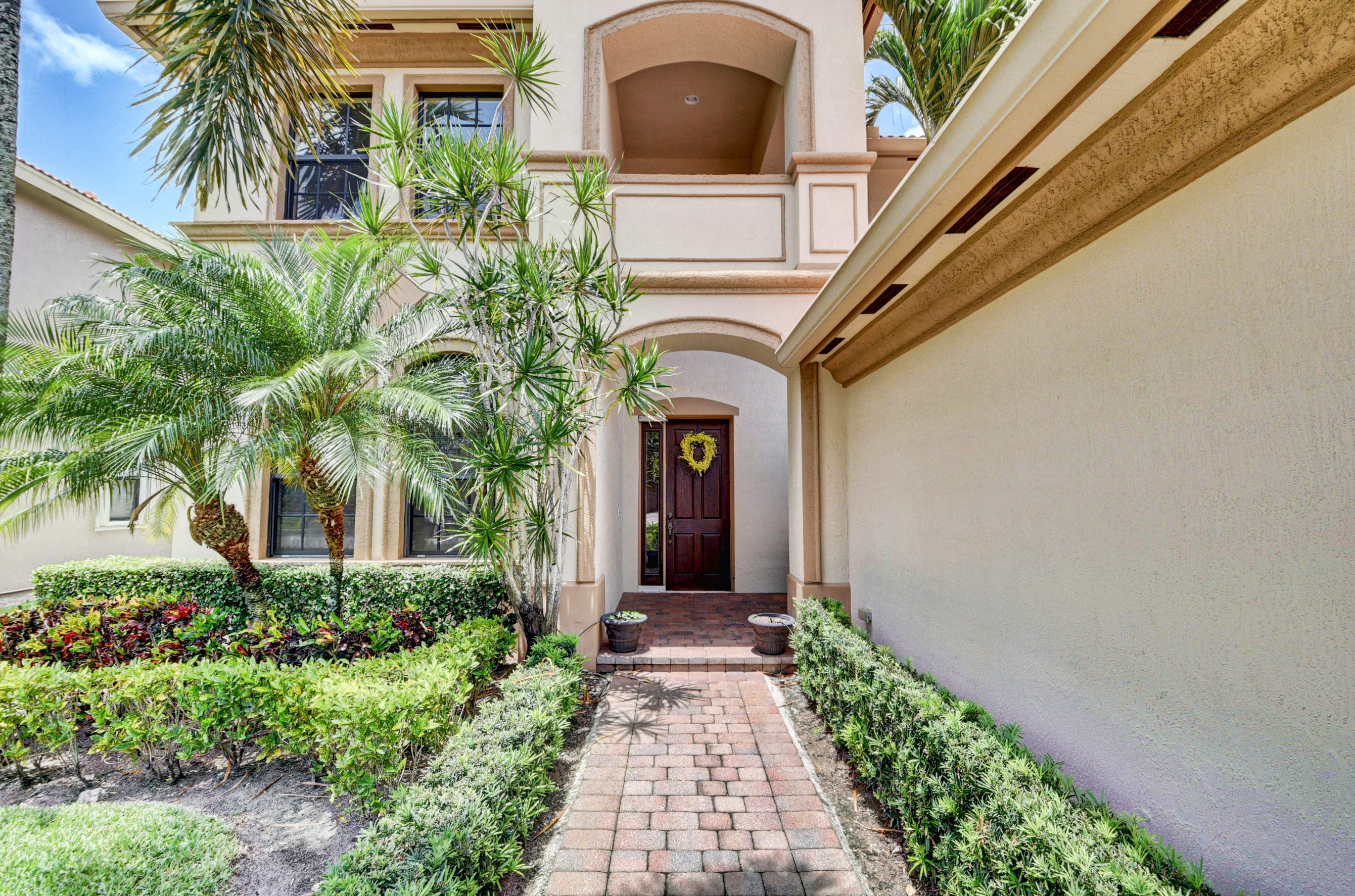 16155 Rosecroft Terrace Delray Beach, FL 33446 - Photo 39 of 40 a front view of a house with a yard