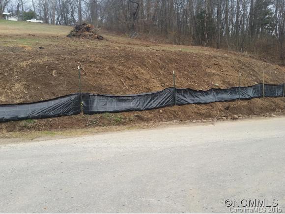 0 Copperhead Road Canton, NC 28716 - Photo 5 of 11 a view of a yard with a wooden fence