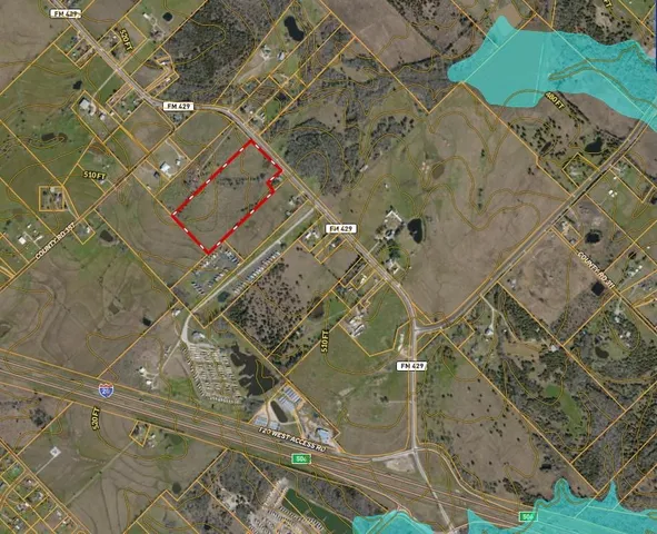 a view of a field with an outdoor space