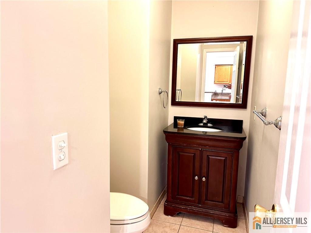 162 Salem Road North Brunswick, NJ 08902 - Photo 4 of 17 a bathroom with a sink and a toilet