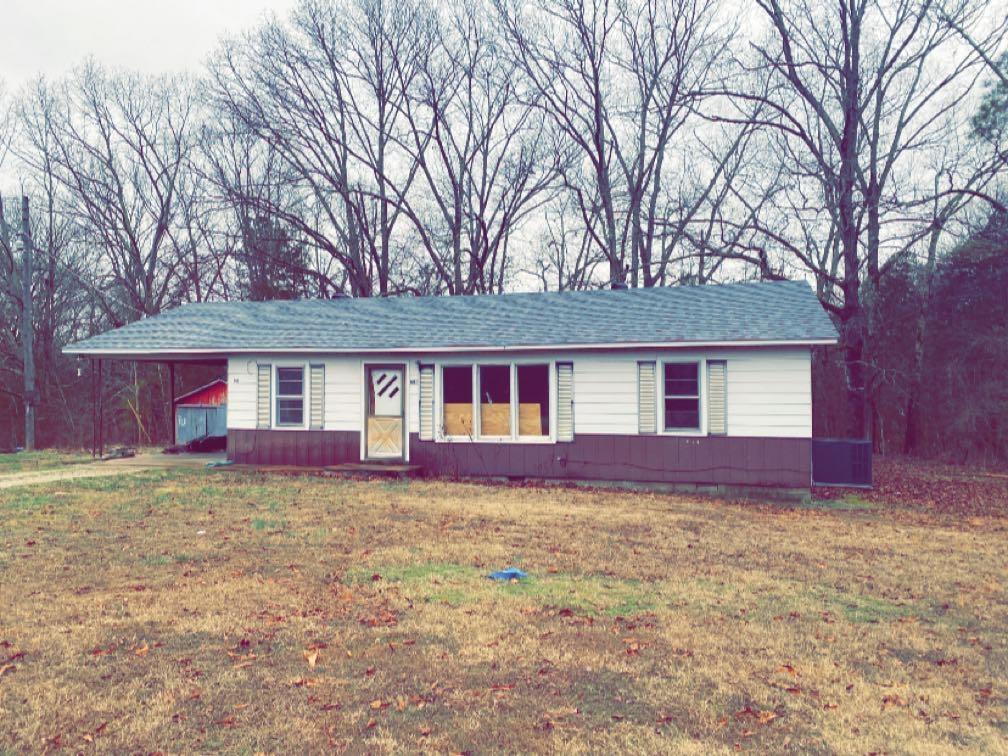 680 Austin Road Reagan, TN 38368 - Photo 1 of 12 a view of a house with a yard