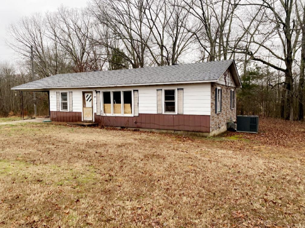 680 Austin Road Reagan, TN 38368 - Photo 3 of 12 front view of a house with a yard