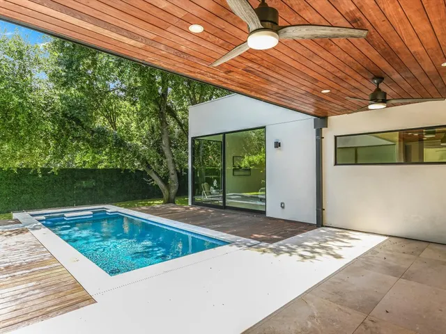 a view of a backyard of a house