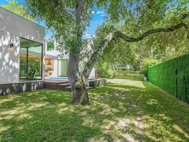 a house view with a garden space