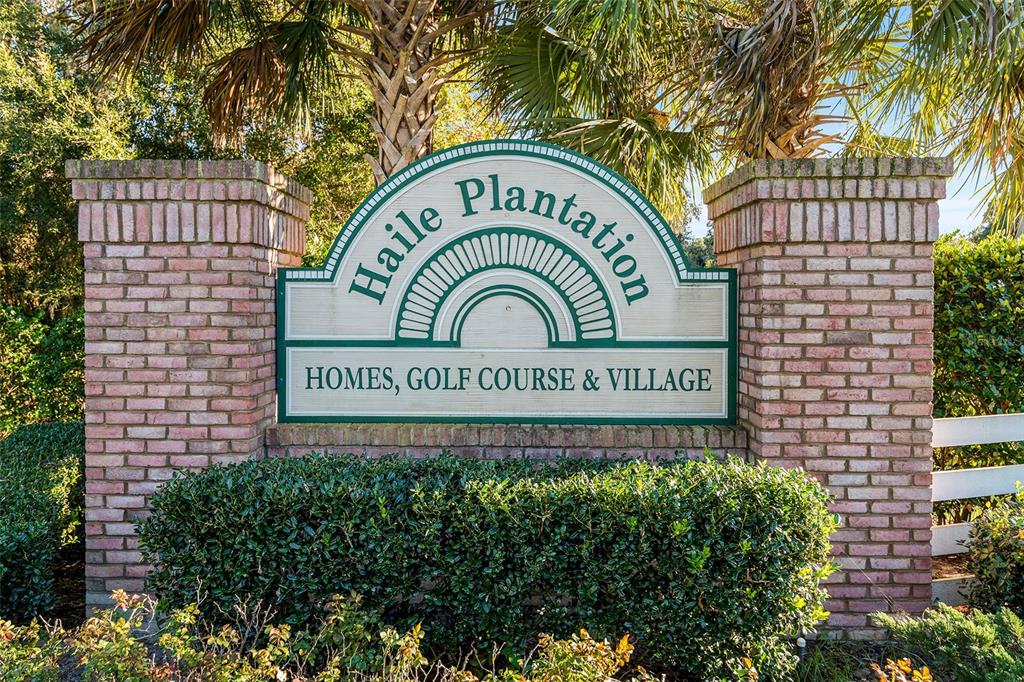5213 Southwest 91 Terrace, Unit B Gainesville, FL 32608 - Photo 33 of 38 a sign on the side of a building