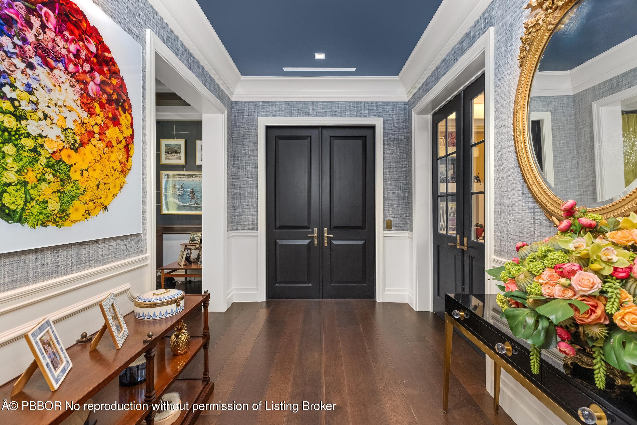 1053 North Lake Way Palm Beach, FL 33480 - Photo 12 of 82 a view of an entryway with wooden floor