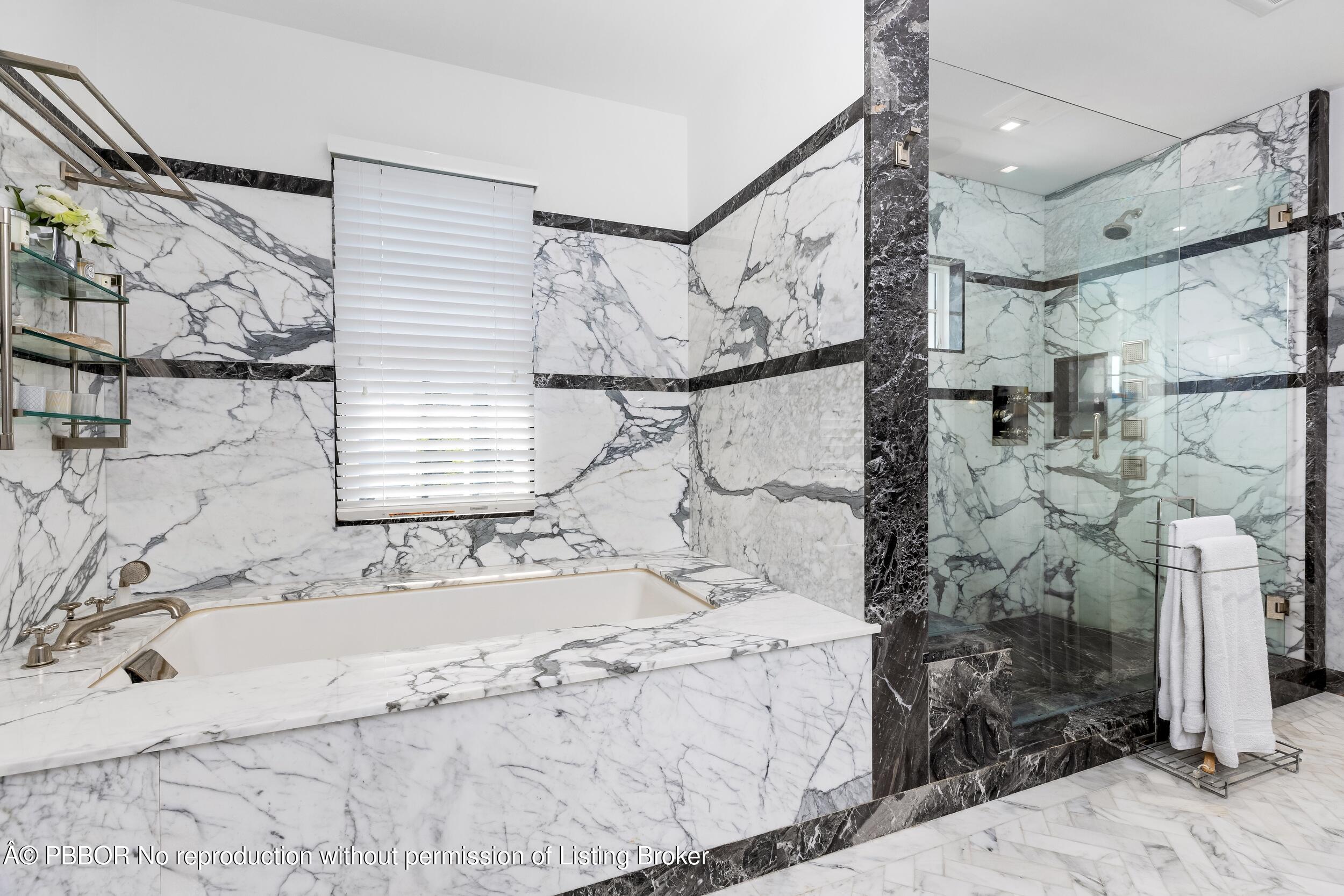 1053 North Lake Way Palm Beach, FL 33480 - Photo 40 of 82 a bathroom with a sink and a shower