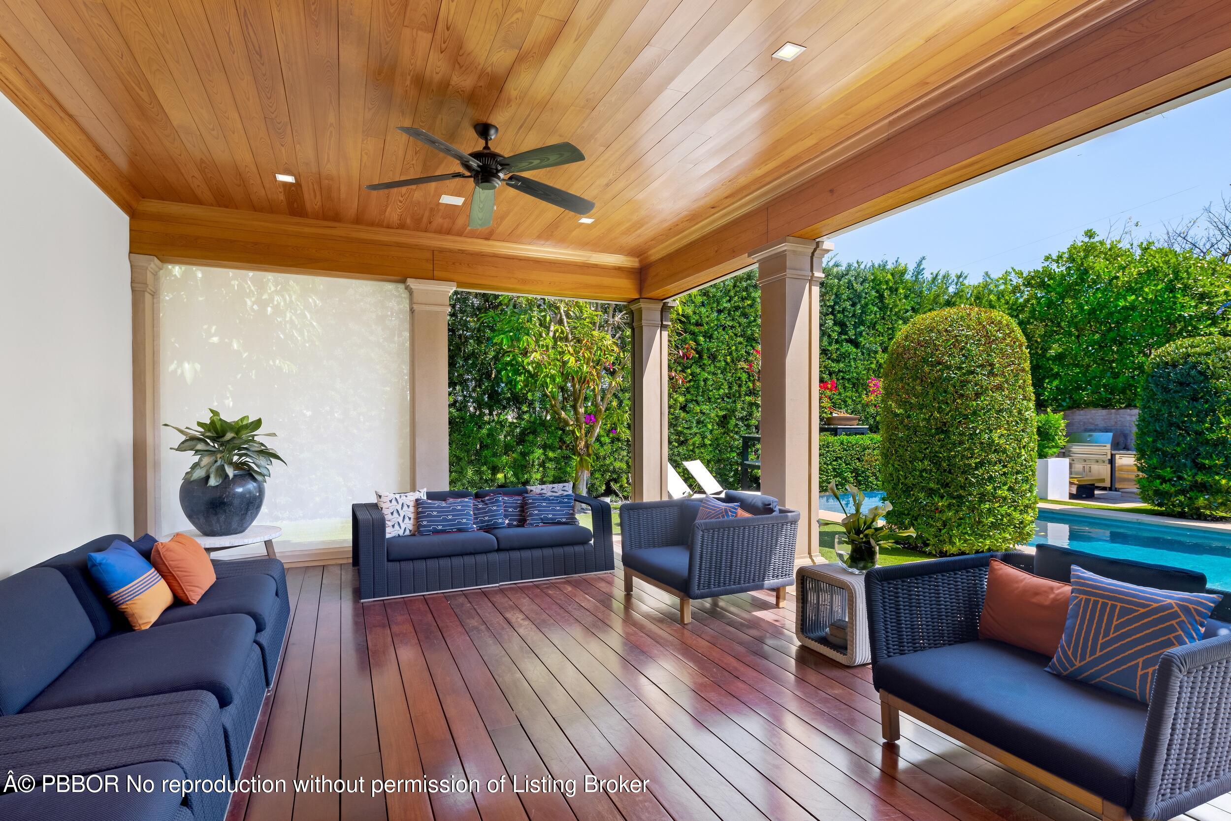 1053 North Lake Way Palm Beach, FL 33480 - Photo 52 of 82 a outdoor living space with furniture potted plant and a large window
