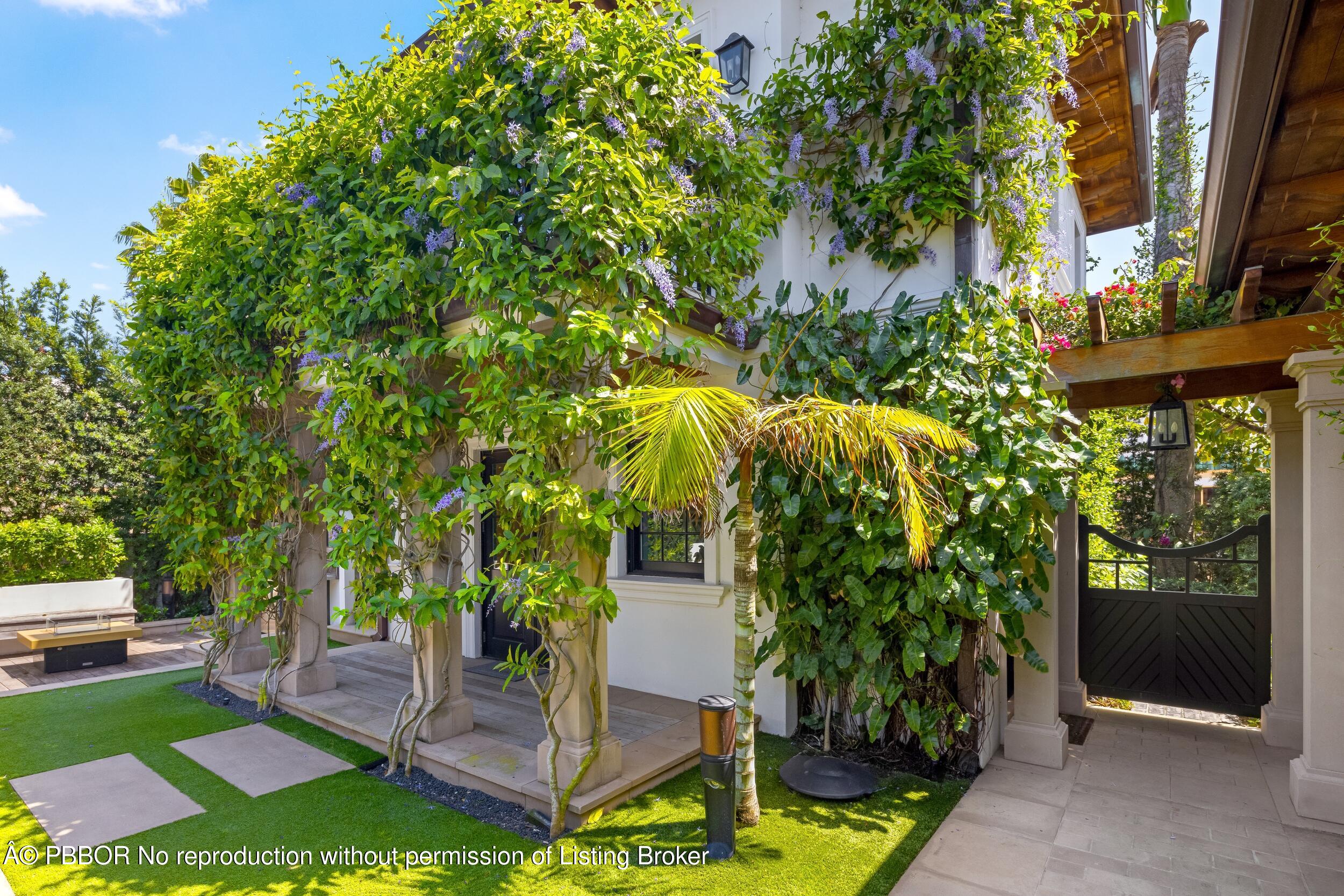 1053 North Lake Way Palm Beach, FL 33480 - Photo 59 of 82 a garden view with a seating space