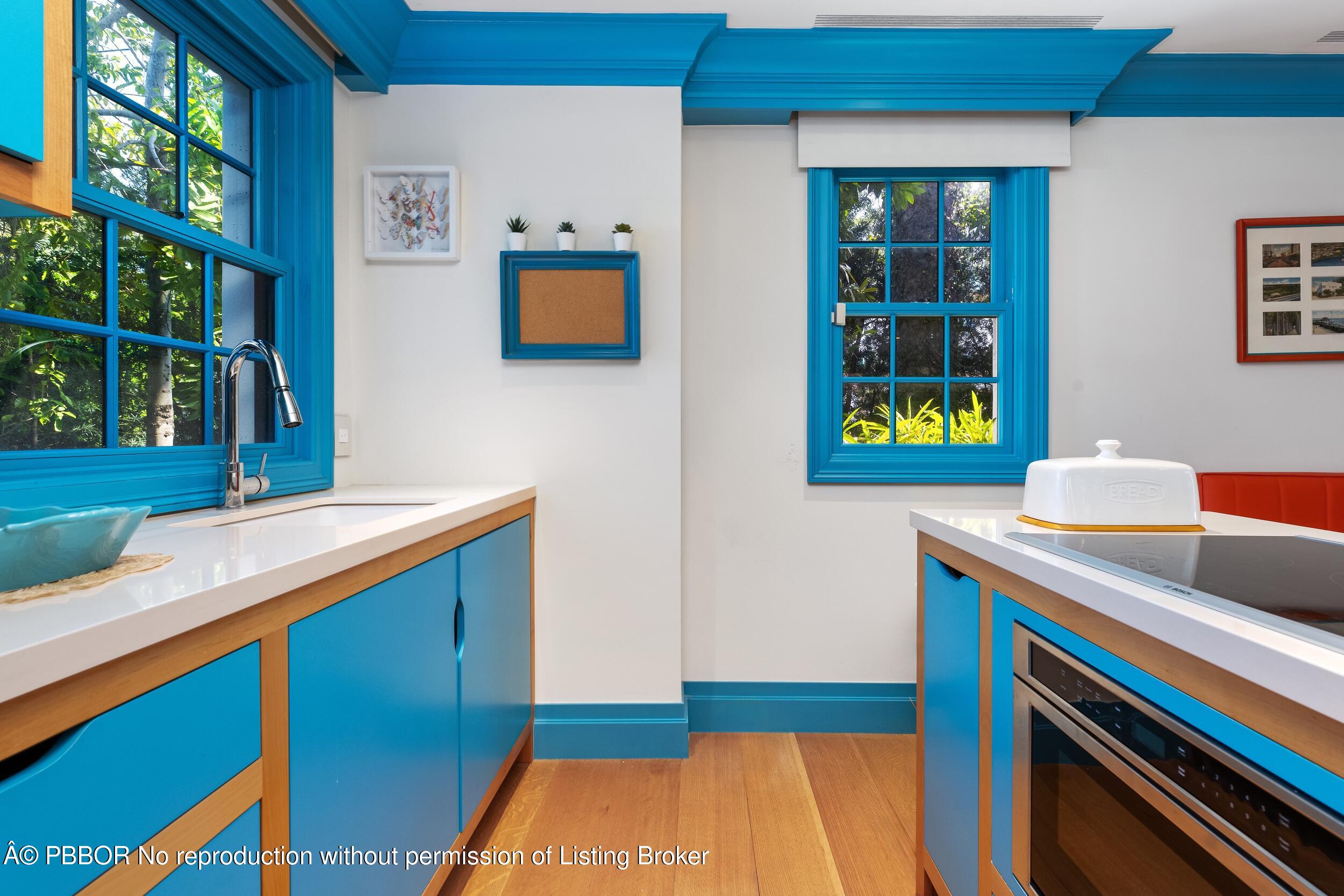 1053 North Lake Way Palm Beach, FL 33480 - Photo 69 of 82 a kitchen with a sink and a stove top oven