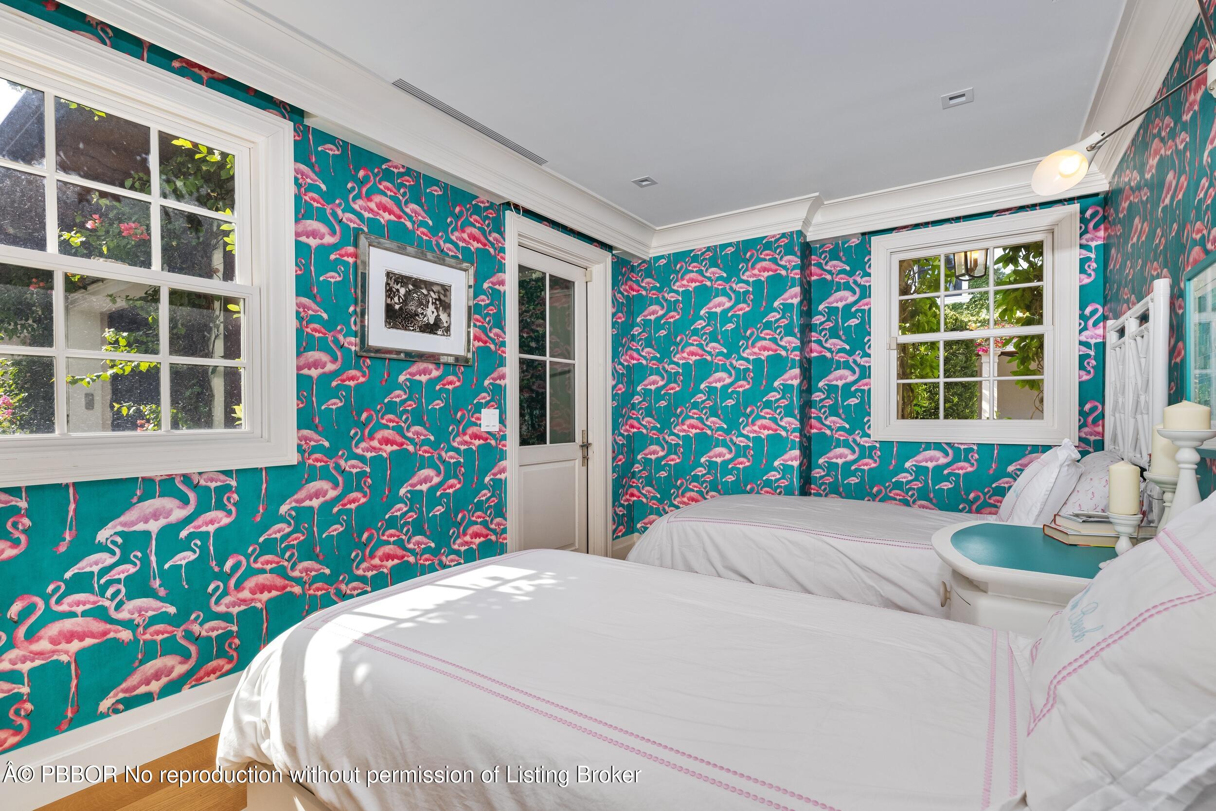 1053 North Lake Way Palm Beach, FL 33480 - Photo 70 of 82 a room with a bed and a couch