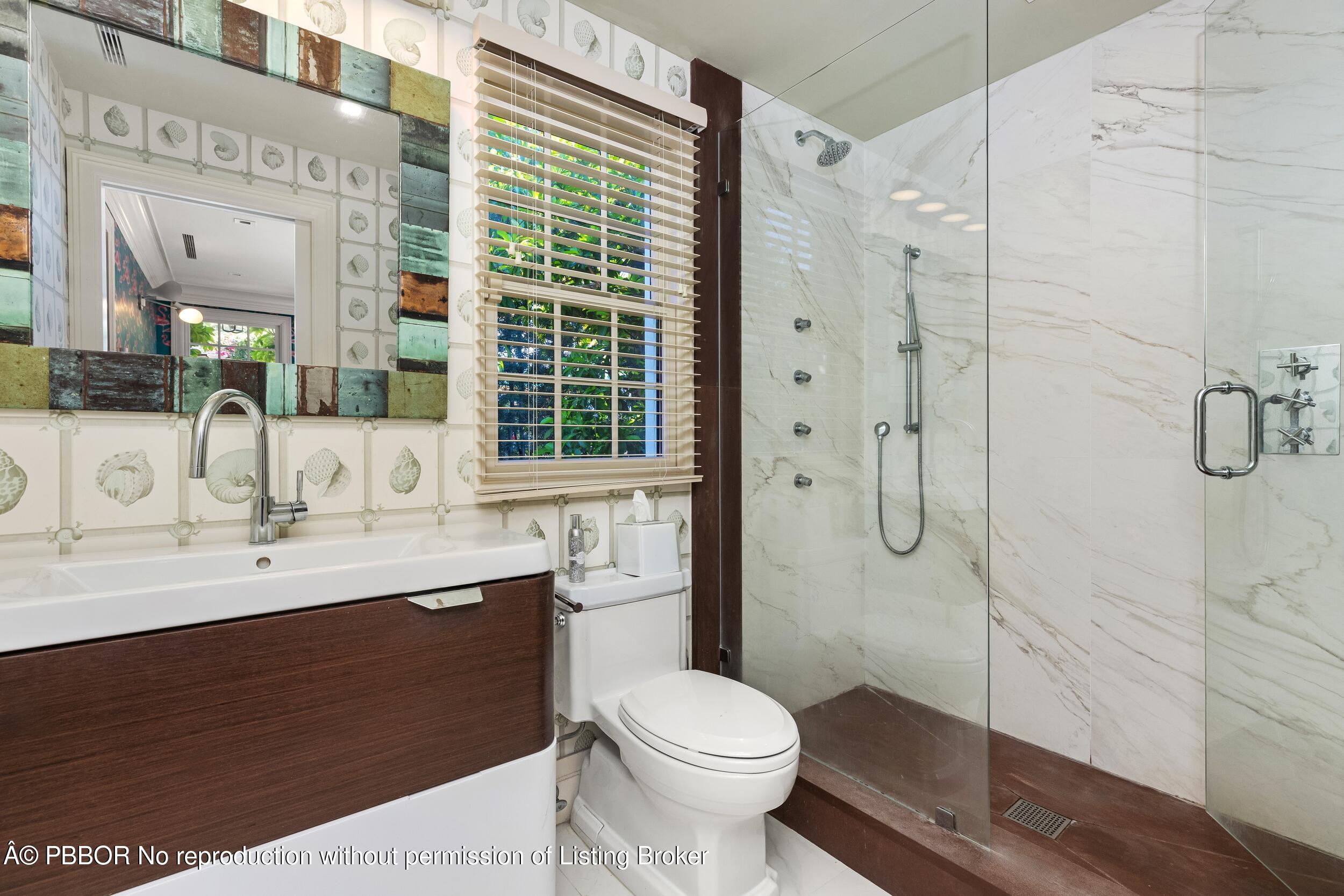 1053 North Lake Way Palm Beach, FL 33480 - Photo 71 of 82 a bathroom with a sink toilet and shower