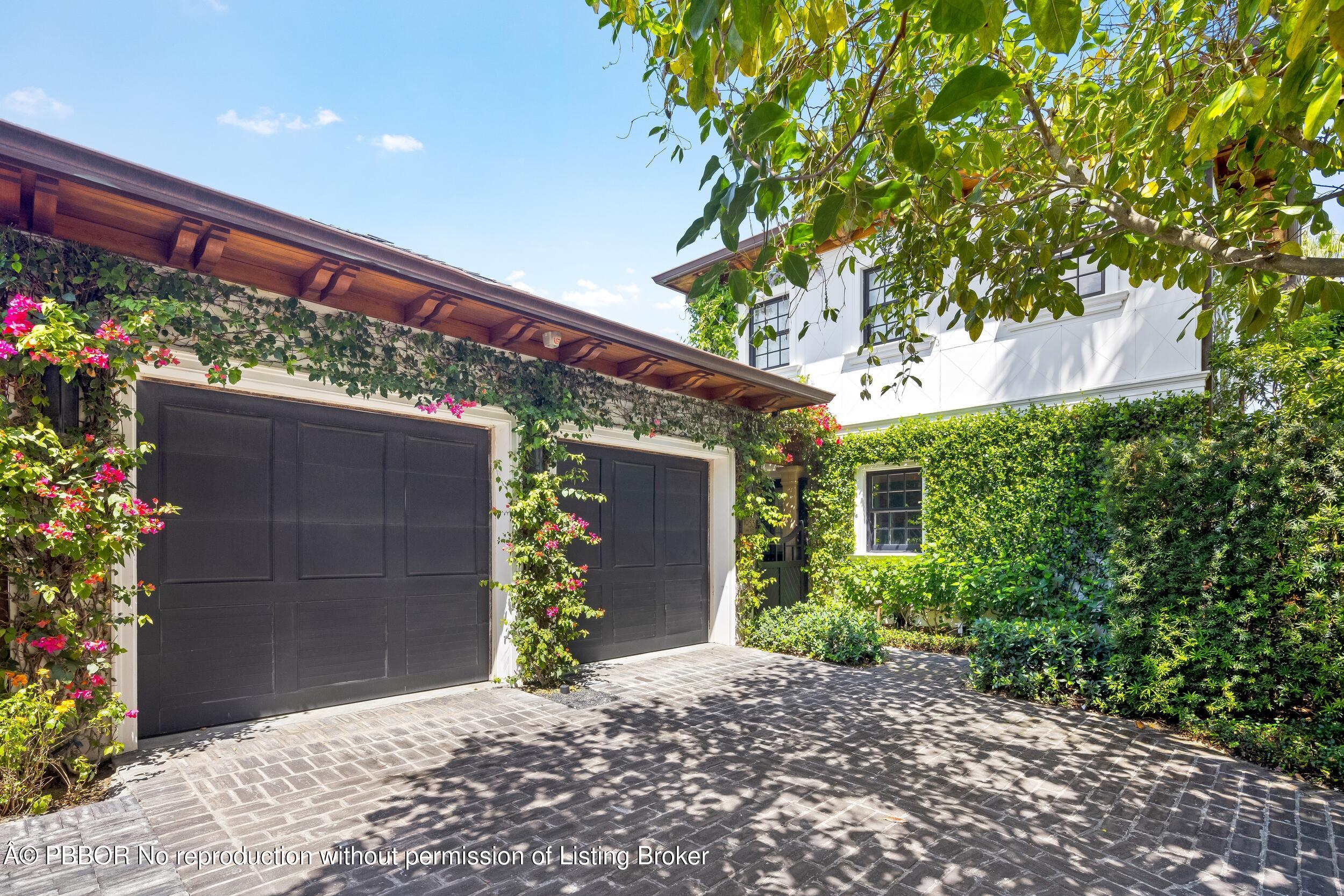 1053 North Lake Way Palm Beach, FL 33480 - Photo 74 of 82 a view of a house with a garage