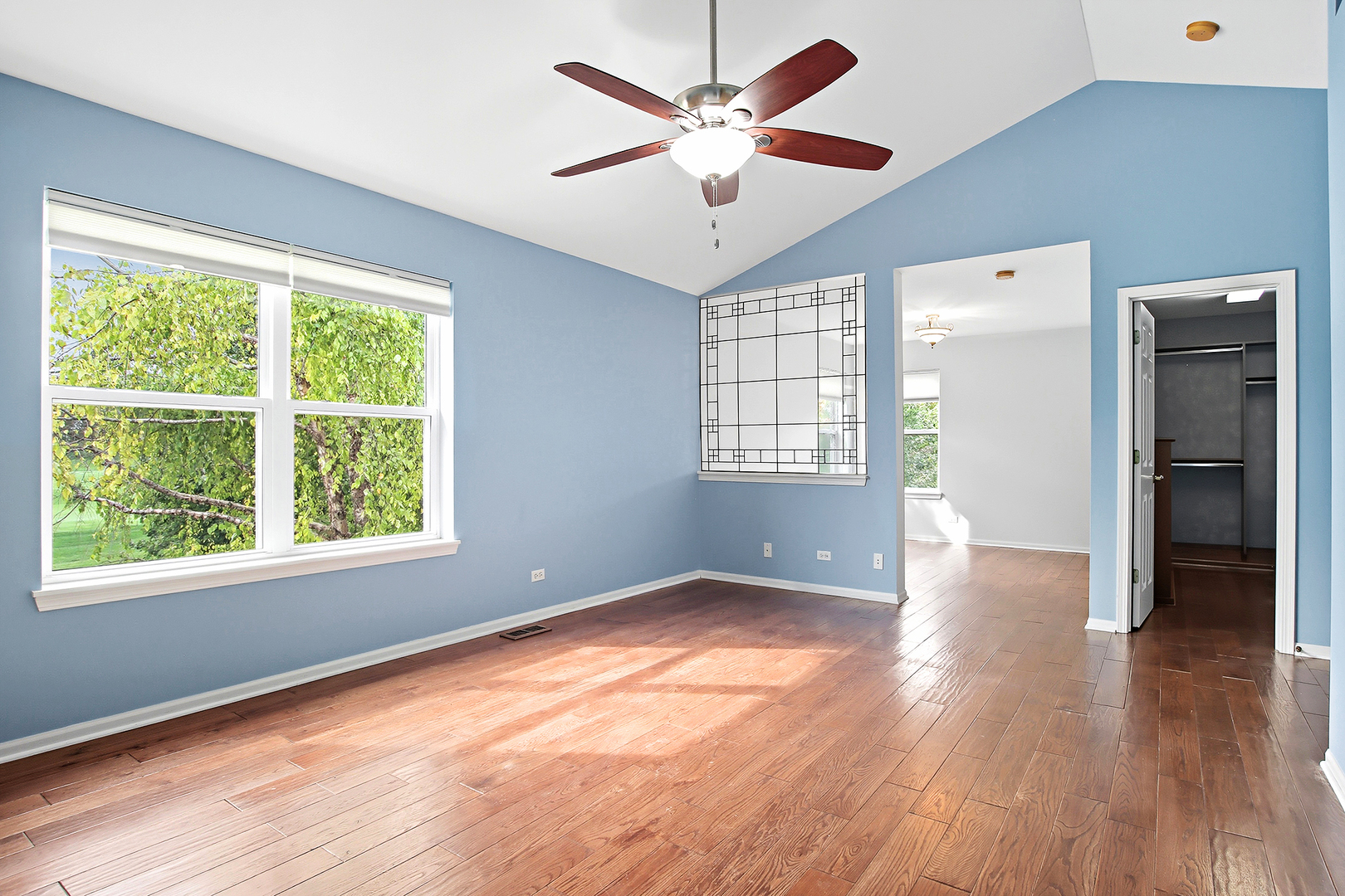 296 Foxford Drive Cary, IL 60013 - Photo 13 of 44 wooden floor in an empty room with a window