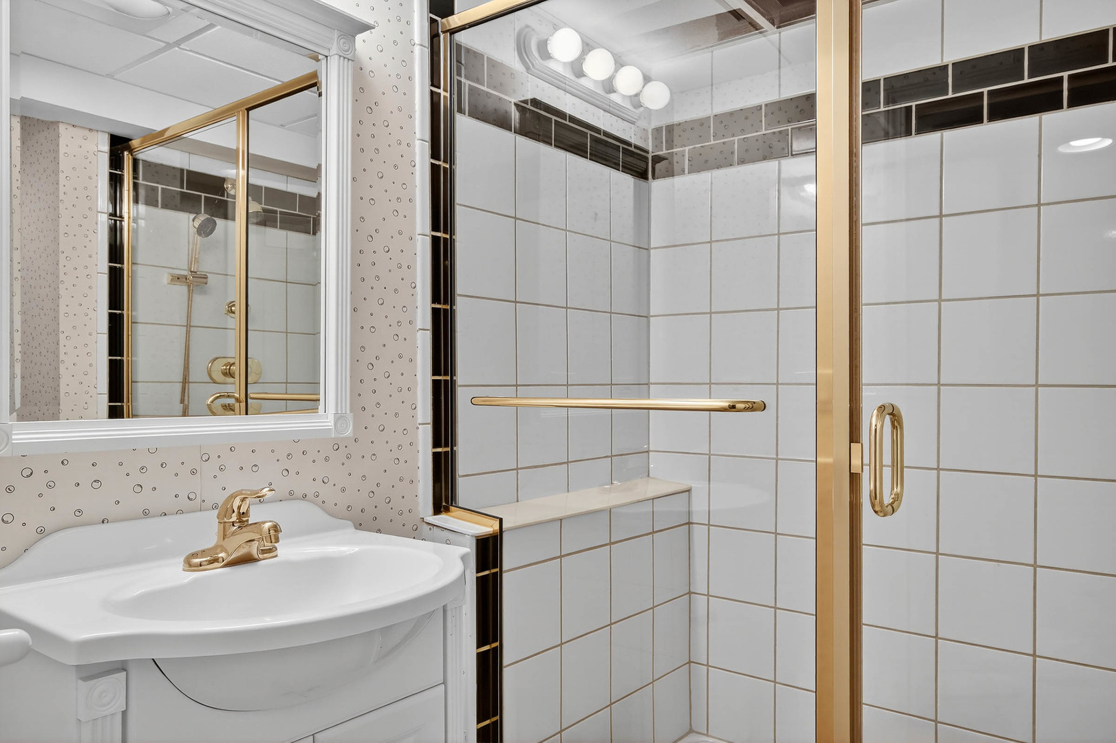 296 Foxford Drive Cary, IL 60013 - Photo 26 of 44 a bathroom with a sink shower and a mirror