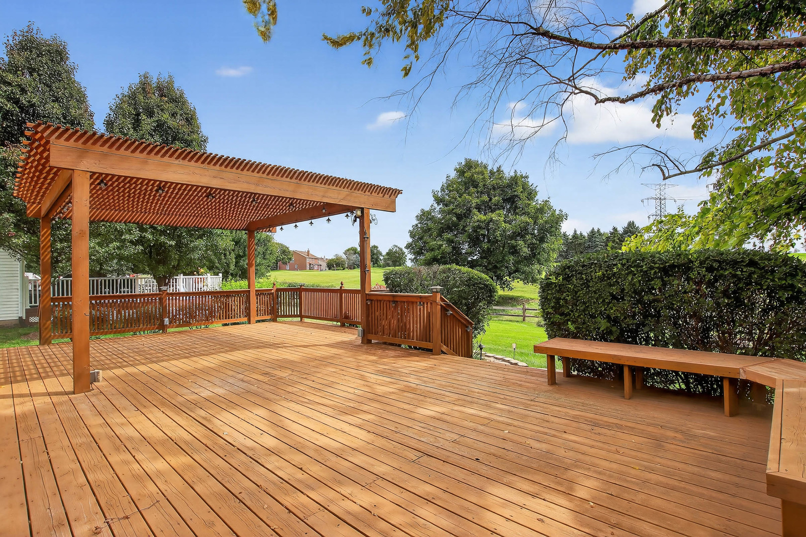 296 Foxford Drive Cary, IL 60013 - Photo 28 of 44 a view of a swimming pool with a patio and a yard