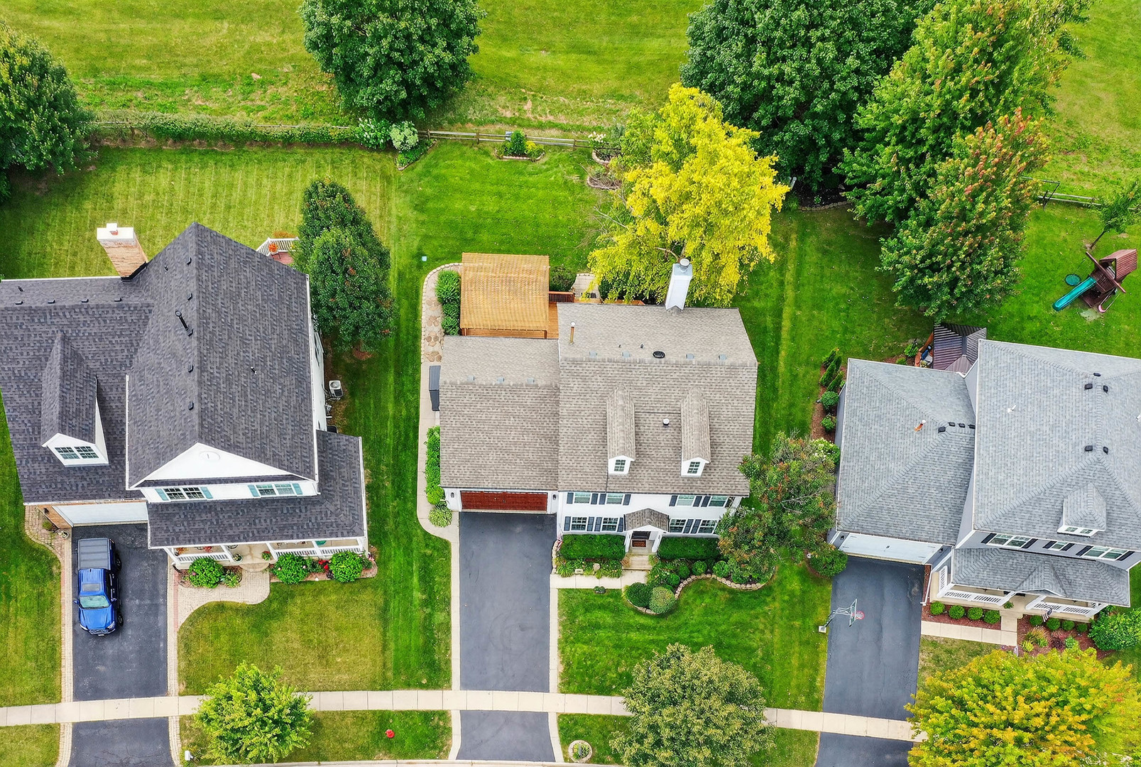 296 Foxford Drive Cary, IL 60013 - Photo 35 of 44 an aerial view of a house with a garden and lake view