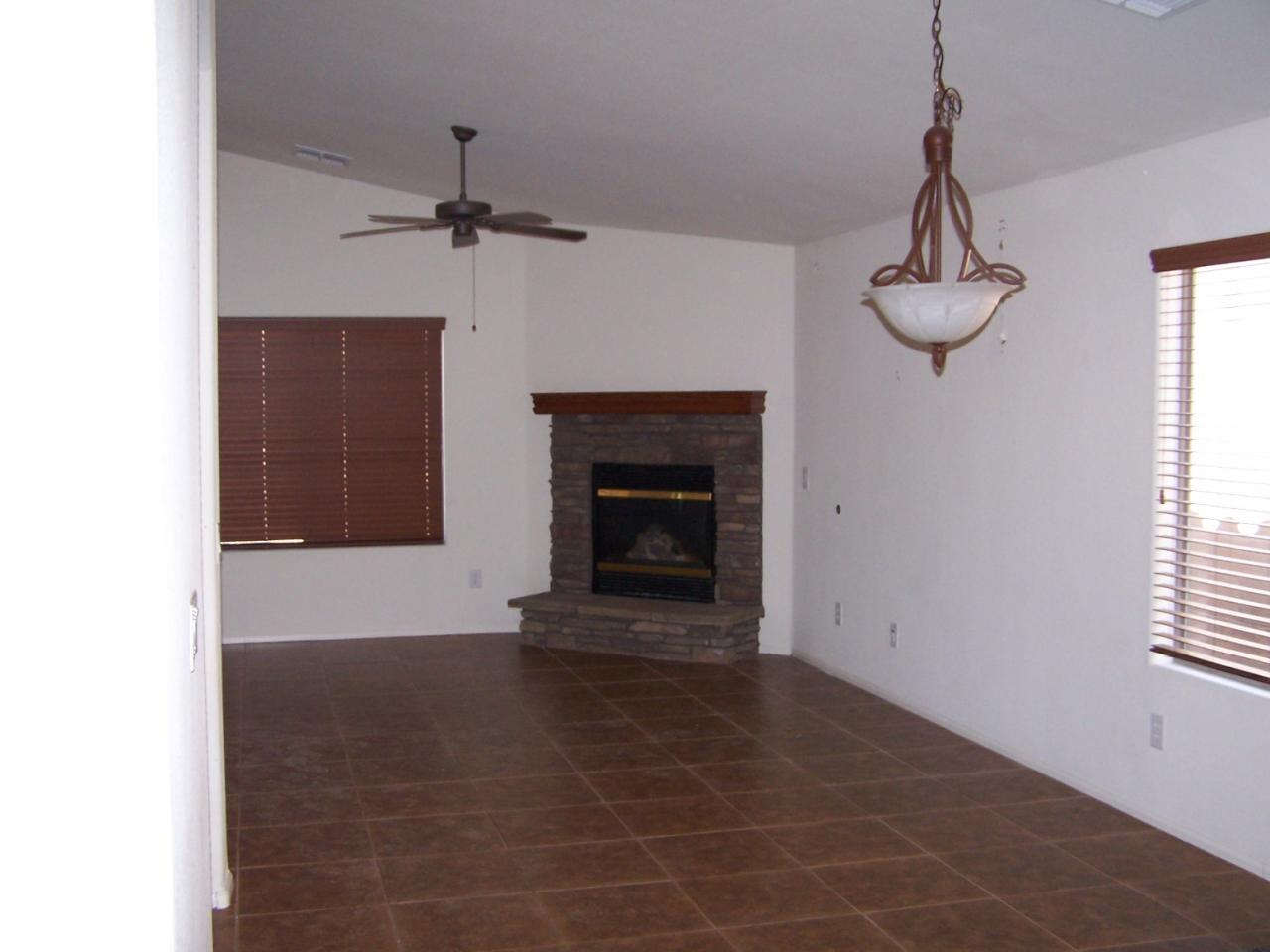 2210 West Peak View Road Phoenix, AZ 85085 - Photo 2 of 3 Family Room & Fireplace