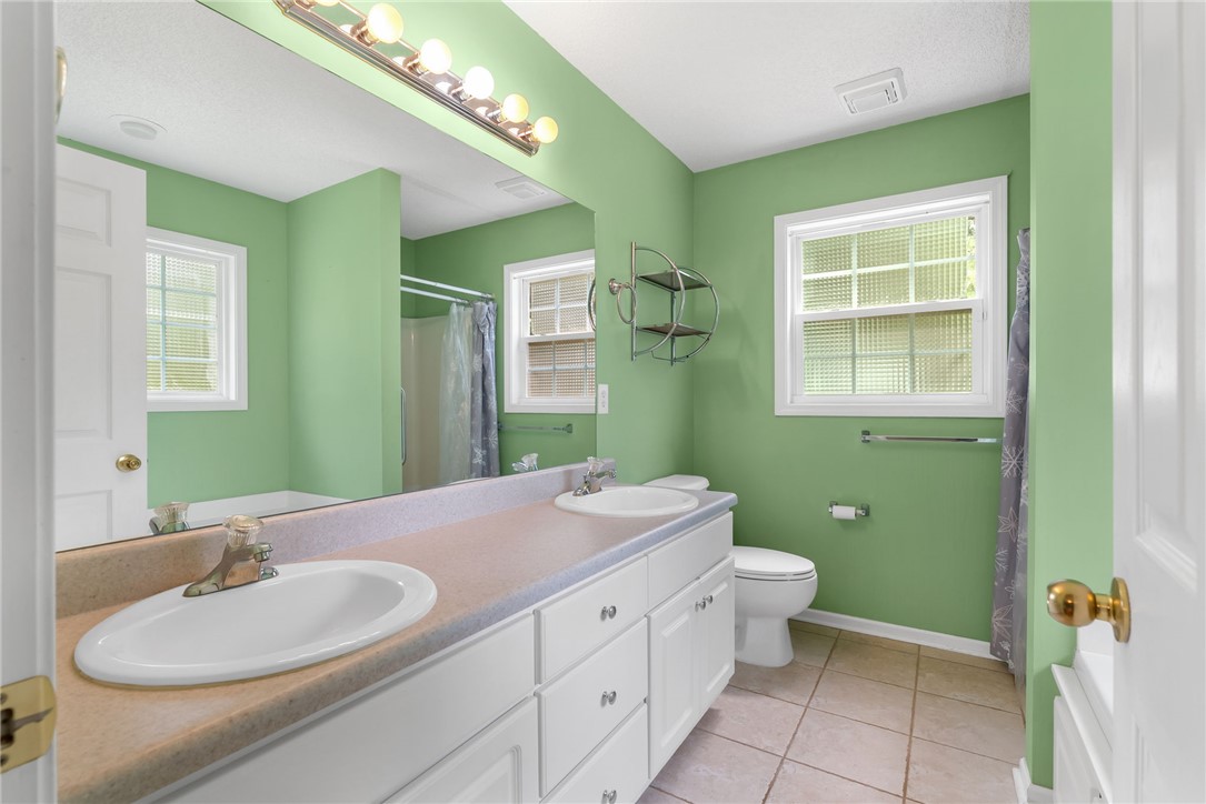 524 Pecan Grove Road Seneca, SC 29672 - Photo 15 of 30 A twin-sink vanity with ample storage complements the bath space.