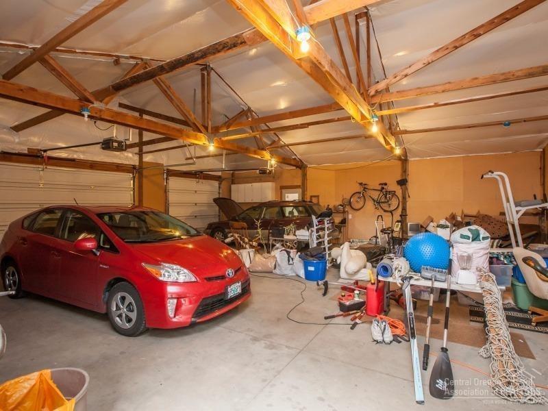 22962 Rickard Road Bend, OR 97702 - Photo 21 of 25 The insulated three-car garage has ample