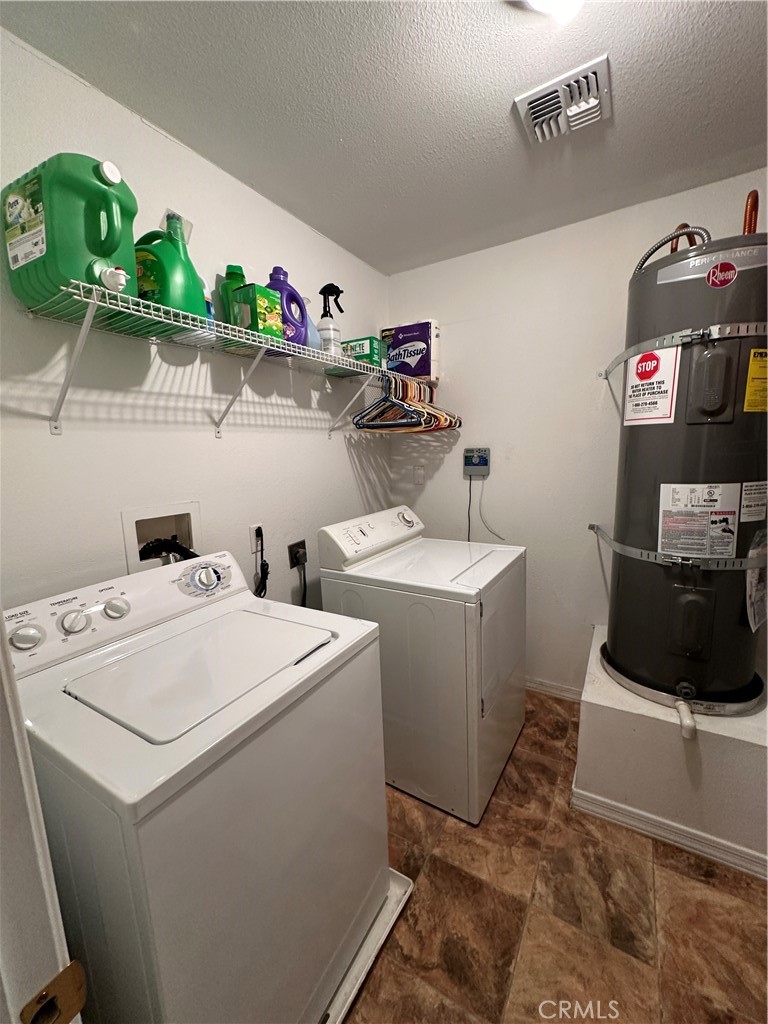 1100 Beach Drive Needles, CA 92363 - Photo 12 of 13 a utility room with dryer and washer