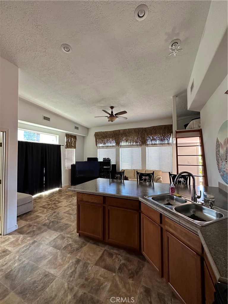 1100 Beach Drive Needles, CA 92363 - Photo 4 of 13 a kitchen with sink and window