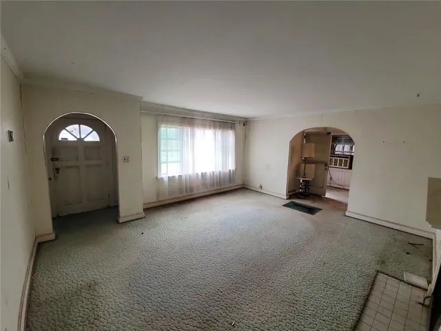 an empty room with windows