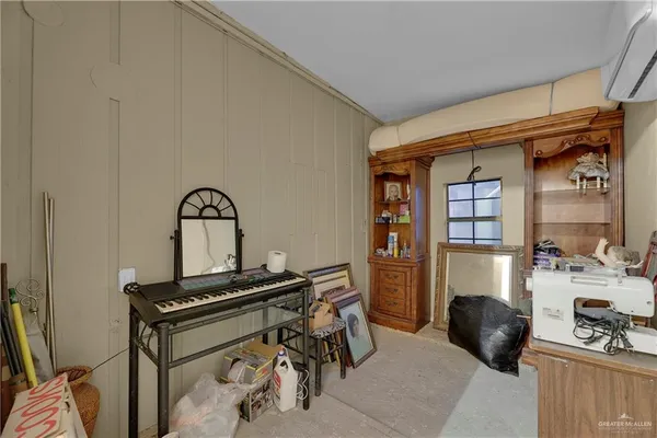 a room with furniture and a piano