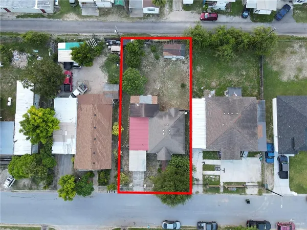 an aerial view of houses and roads