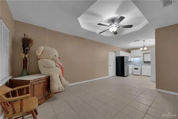 a view of a livingroom with a furniture