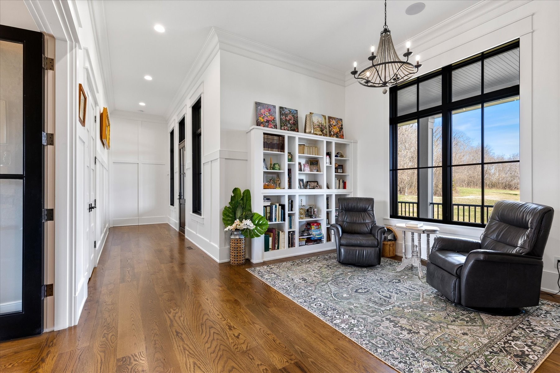 6180 Southeast Tater Peeler Road Lebanon, TN 37090 - Photo 16 of 89 a living room with furniture and a chandelier
