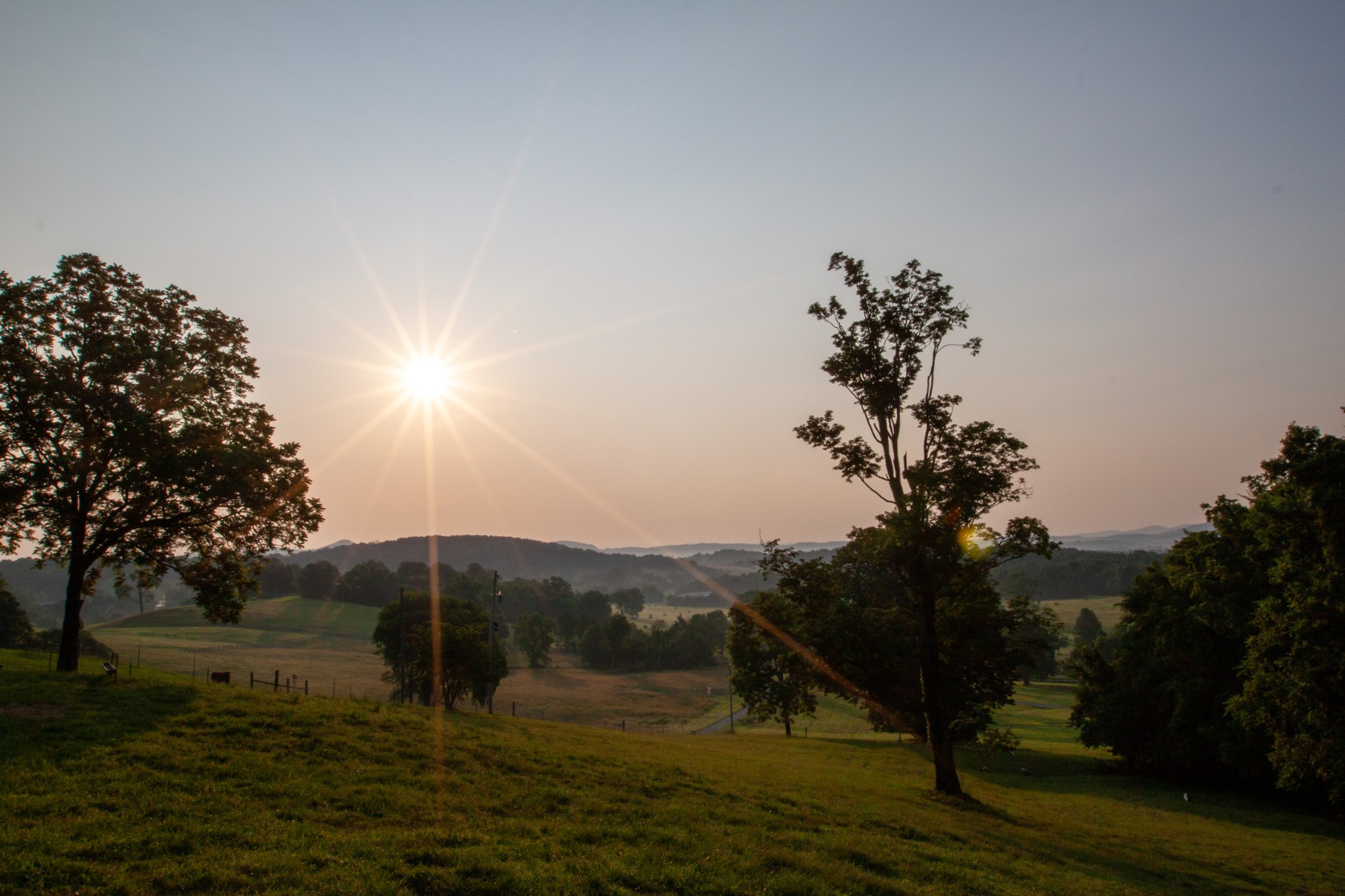 6180 Southeast Tater Peeler Road Lebanon, TN 37090 - Photo 2 of 89 a view of a lake with a mountain in the background