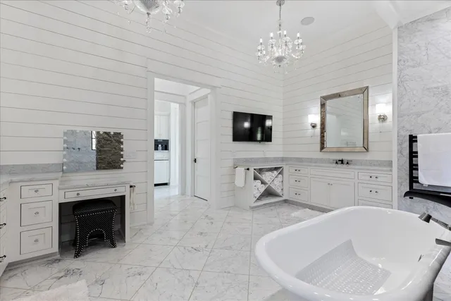 a spacious bathroom with a granite countertop sink a toilet and a mirror