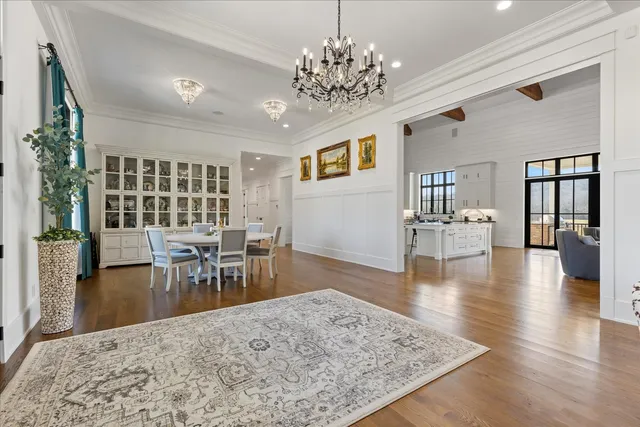 a kitchen with stainless steel appliances granite countertop a stove and cabinets